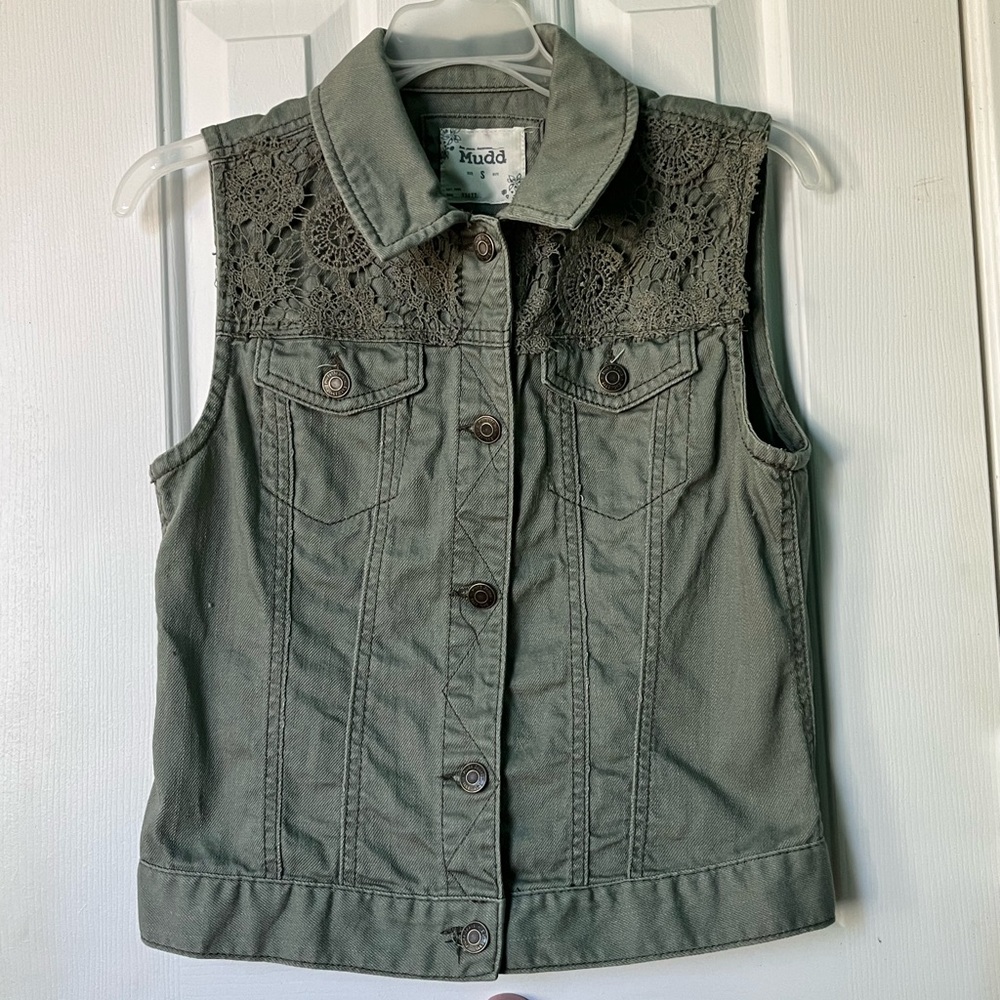 Woman’s green vest